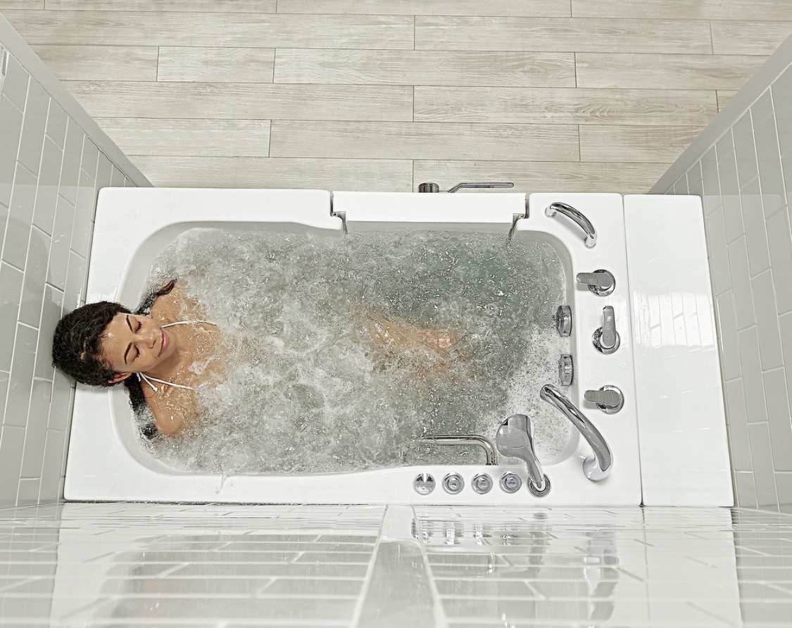 Hydrotherapy tub with jets in use