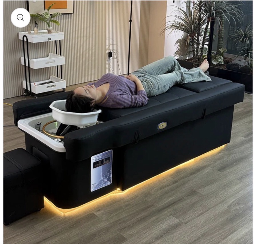 Guest relaxing on the Full Circle vibroacoustic bed